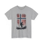 Gray t-shirt with a graphic of a person hiking in front of a cross and red pattern on a white background