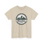Beige t-shirt with 'Wander Further' graphic design on a white background