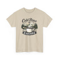 Beige t-shirt with 'Cold Brew & Cascades' graphic design on a white background