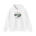 An outdoor scenic graphic with a snowy scene with a snowmobile and pine trees and mountains in the background, with the text 'ski and ride, winter adventure', perfect for outdoor adventure seekers.