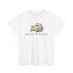 cartoon dog laying on a beanbag eating doughnut and text 'just here for the food' on a white background