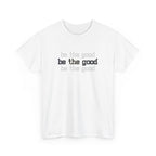 White t-shirt with 'be the good' text printed on a white background