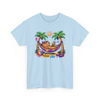 Light blue t-shirt with a colorful graphic of a capybara in a hammock between palm trees on a white background.